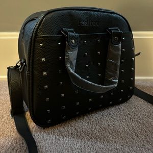 Rad rev mid size cross body vegan leather purse